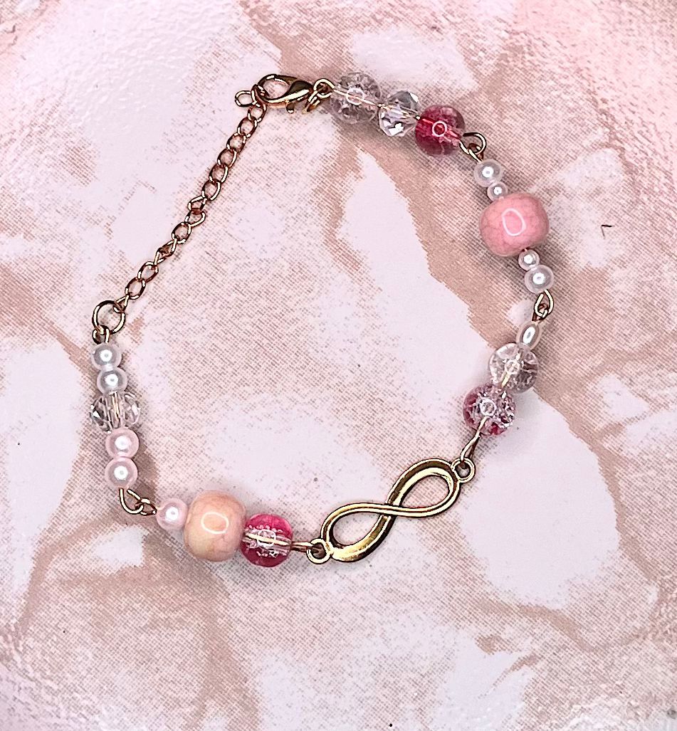 Infinity Charm Mixed‑Bead Bracelet (Blush & Crystal)