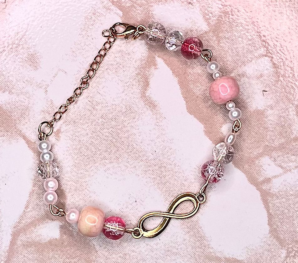 Infinity Charm Mixed‑Bead Bracelet (Blush & Crystal)