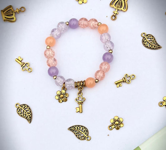 Pastel Key & Daisy Charm Bracelet